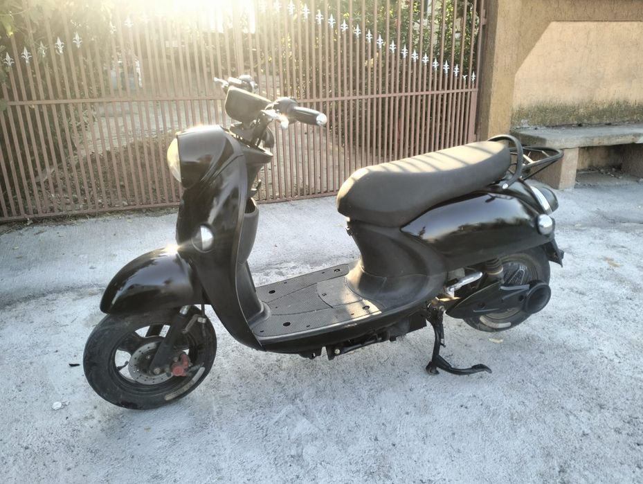 Schimb scuter electric cu o trotineta electrica