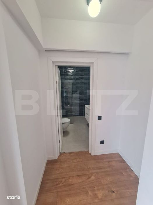 Apartament finisat, 52 mp utili, terasa 34 mp, zona Terra