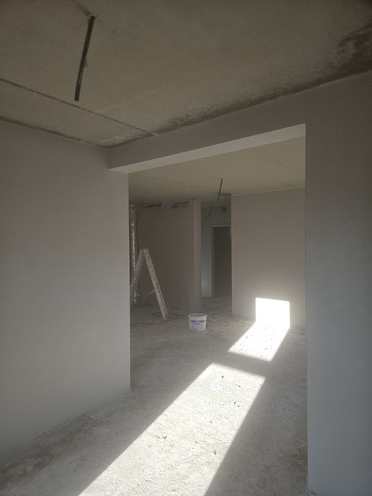 Execut tencuială mecanizată