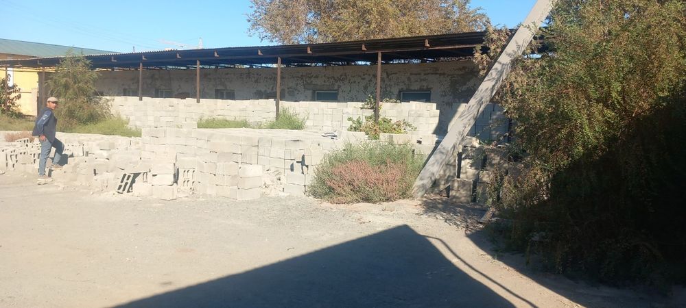 Урганч шахарда ишлаб чикаришга мулжалланган бино ва 20 сотик ер майдон