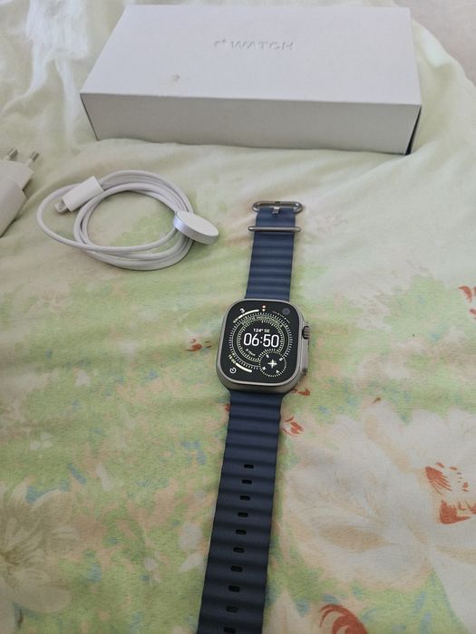 Apple Watch Ultra 3, GPS + Cellular, Carcasa Natural Titanium 49mm, Anchor Blue Ocean Band Perfect