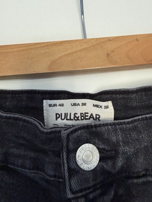 Blugi negri cu ruptura