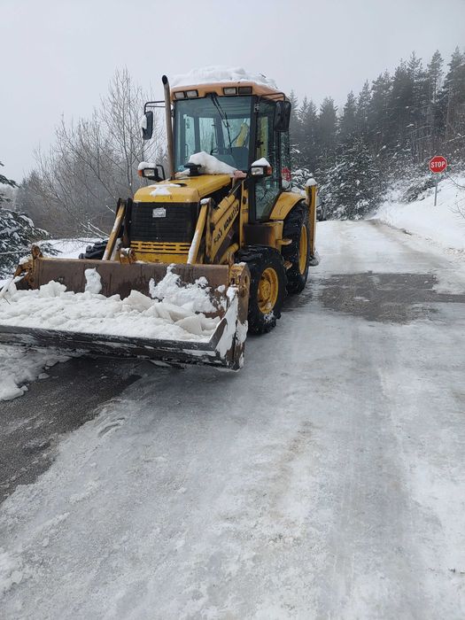 услуги със самосвал ,мини багер ,челен товарач и комбиниран багер