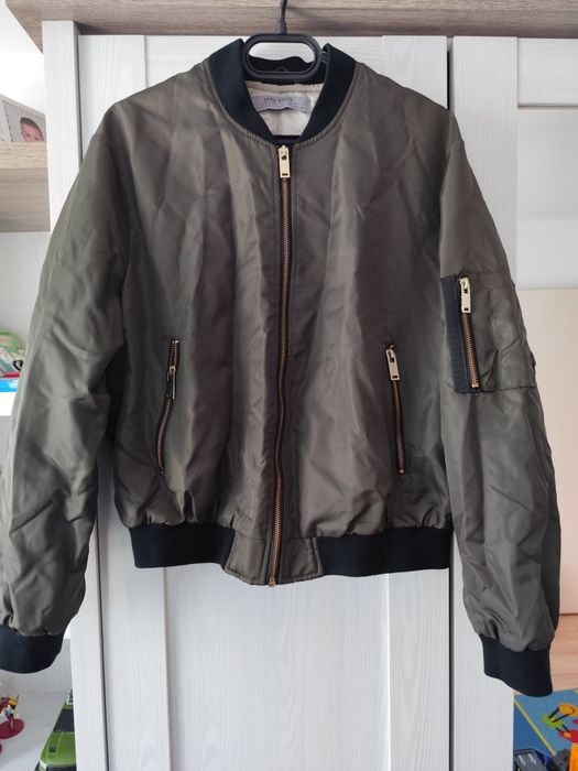 Преходно тъмно зелено дамско яке