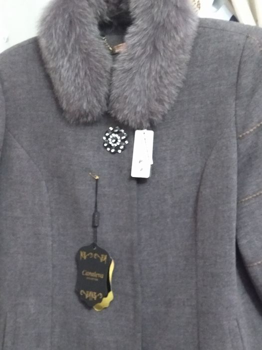 Польто сотилади янги.