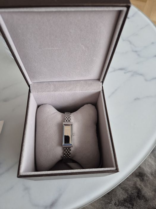 Дамски часовник Gucci.