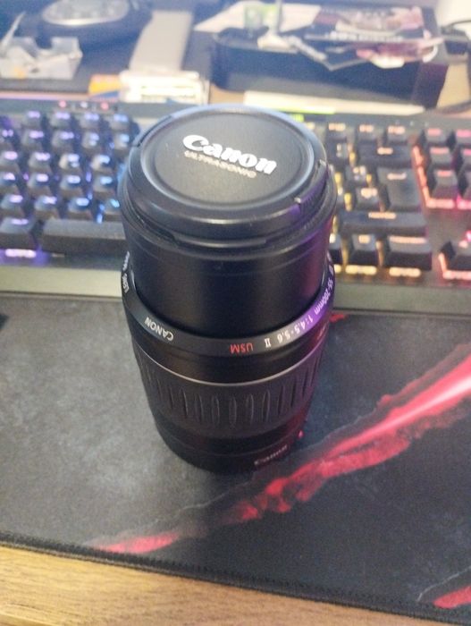 Canon EF 55-200mm f/4.5-5.6 II USM si Olympus 14-42mm f/3.5-5.6 EZ ED