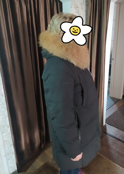 Продам женский пуховик.