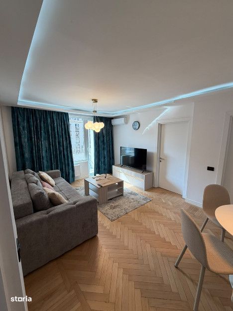 Apartament 2 camere| 2' metrou P-ta Romana| Centrala proprie|