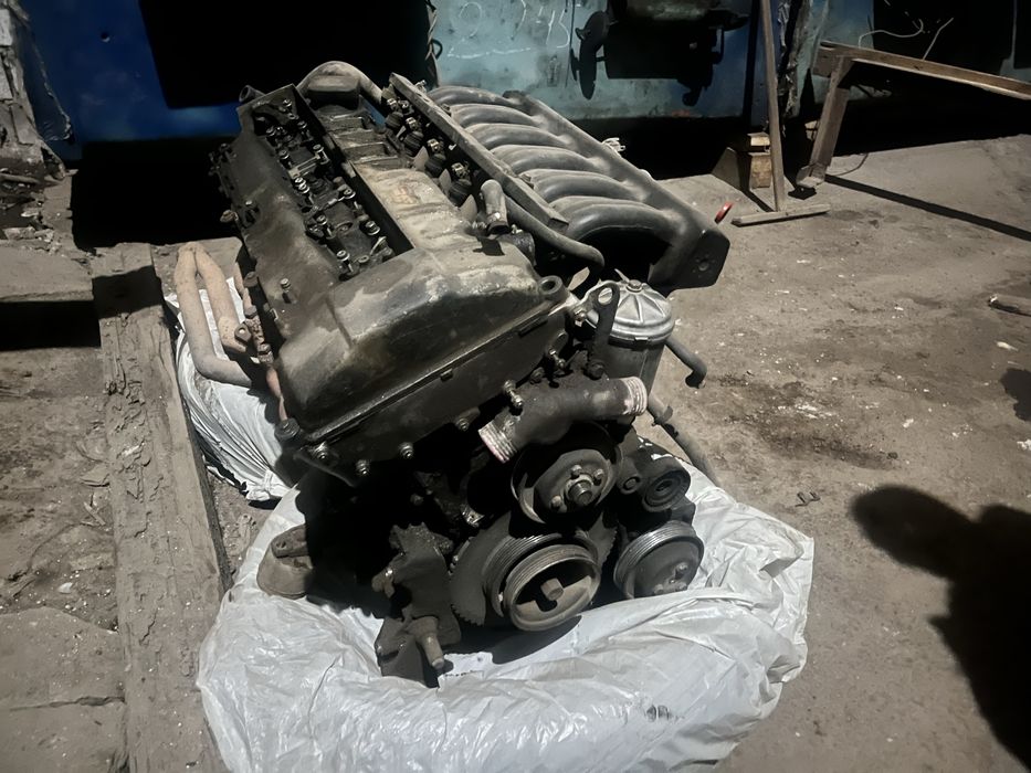 Двигатель м50b20