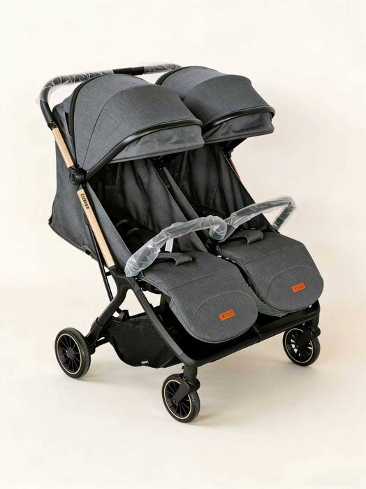 Коляска двойняшки близнецы