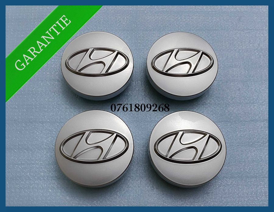 Set 4 capace argintii 57mm jante aliaj Hyundai