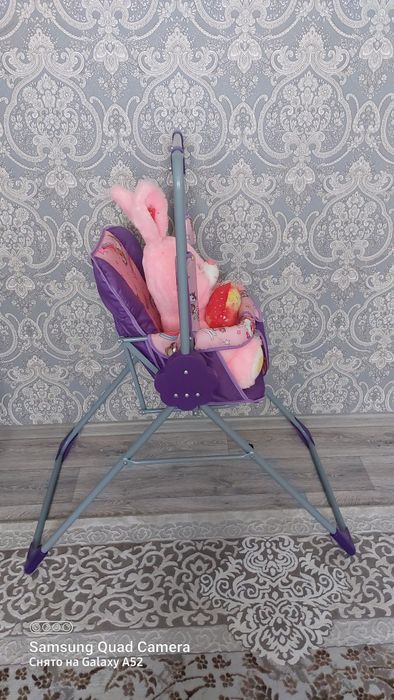 Детская качеля с шезлонгом.