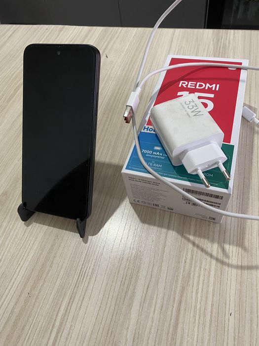 REDMI 15 ……………..