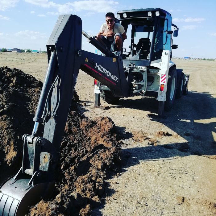 Услуги экскаватор погрузчик HIDROMEK гидромолот