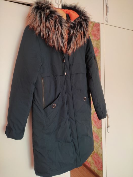 Продам пуховик 46 размер