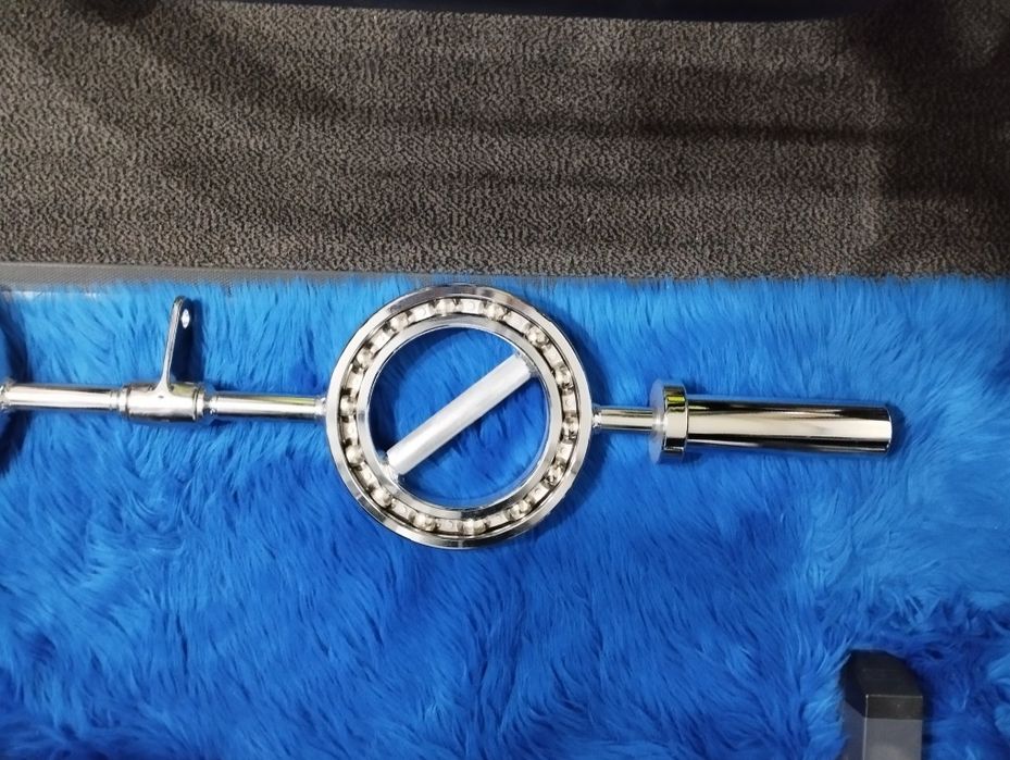 Олимпийски лост с въртящи се рингове