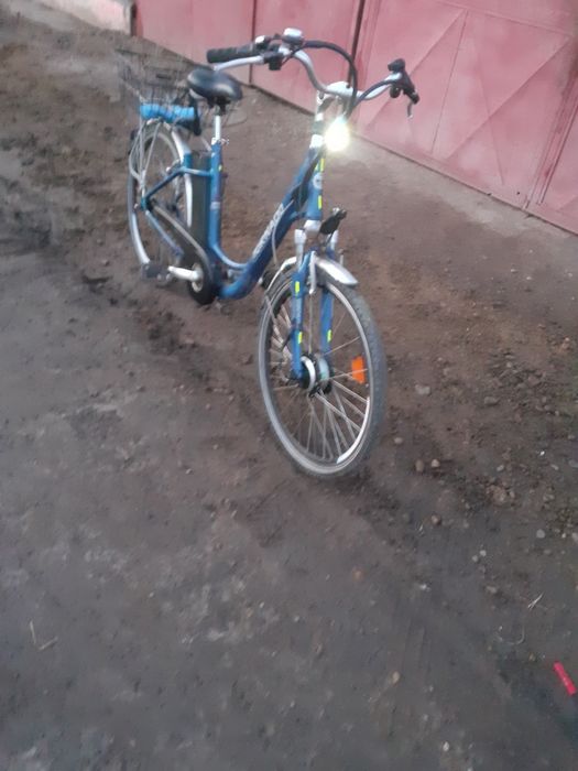 Bicicletă electrică asistată de firmă utilaje