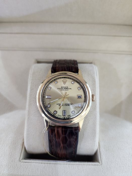 Продам золотые Ролексы.