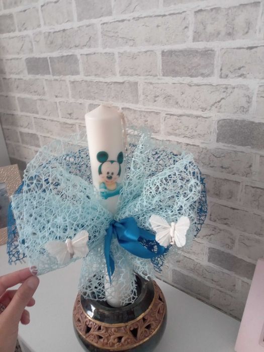 Vând lumânări botez