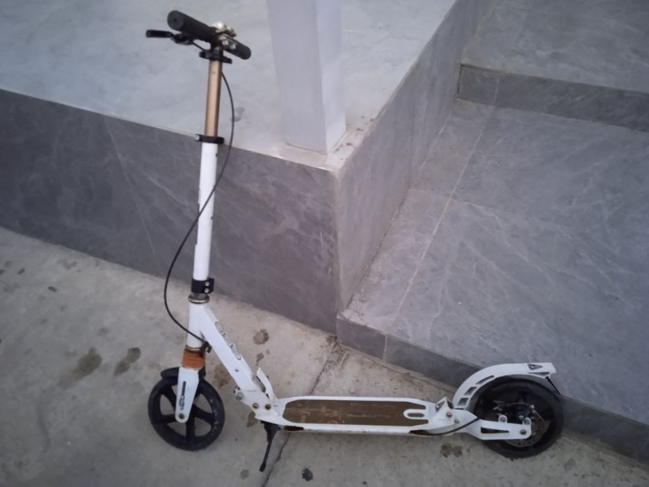 Самокат в бывшим употребление