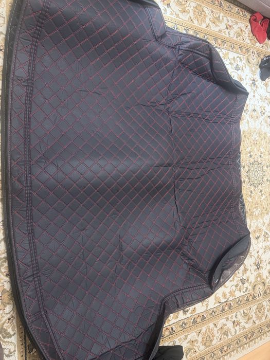 Полик в багажник Onix