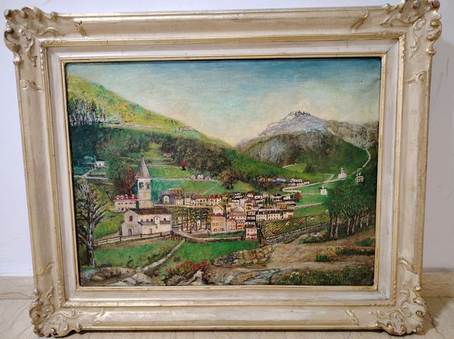 Ulei pe pânză,dimensiuni mari încadrat într-o ramă stil Baroc, reprezentând un peisaj pitoresc de munte cu o așezare. 
Tip obiect: Pictură artistică d
