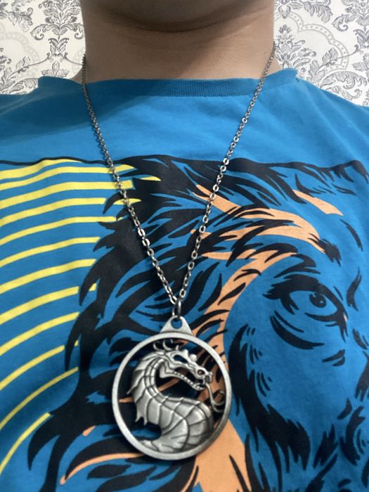 Продам кулон мортал комбат