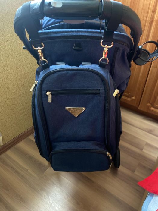 Прогулочная коляска с рюкзаком