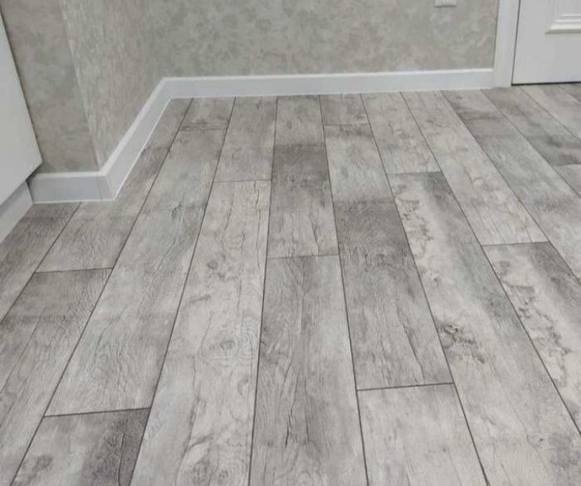 Уклада ламината и плинтуса