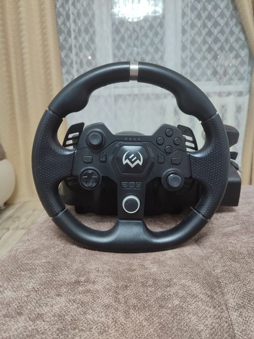 Продам игровой руль для компьютера .