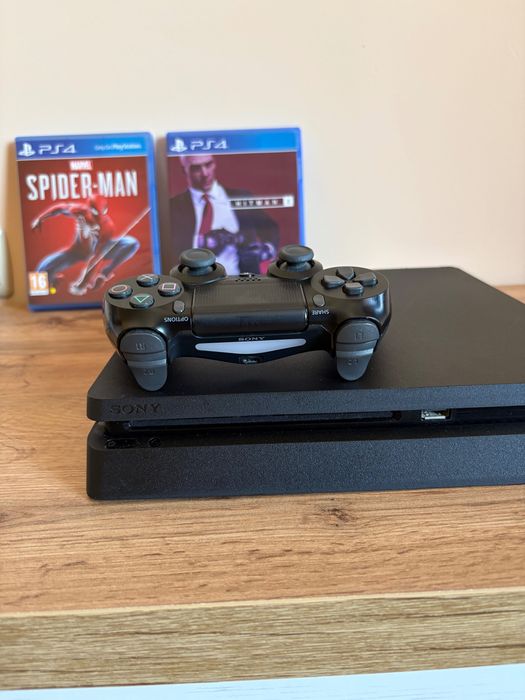 PlayStation 4 slim + 2 джойстика и 7 игри