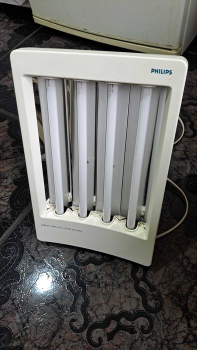 Solar facial bronzare Phillips