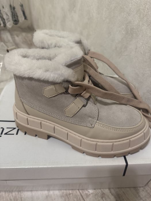 Продам новые зимние сапоги