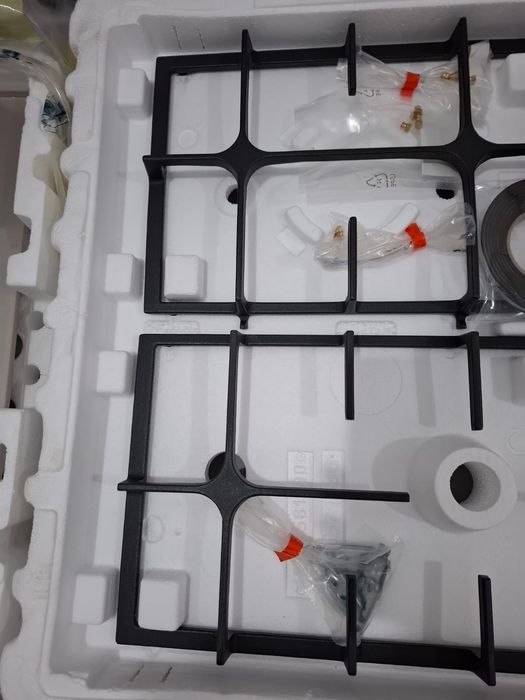 Plită incorporabilă Whirpool,sticlă crem