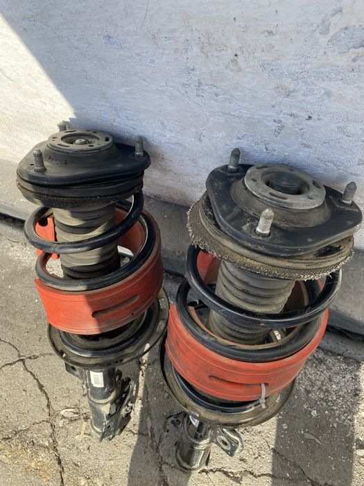 Стойки передние Эстима 2.4 50 кузов