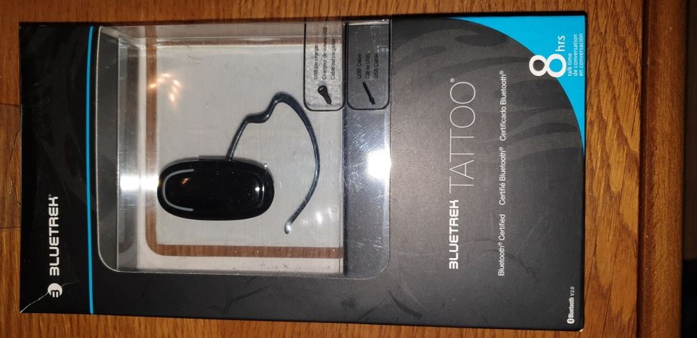 Casca buetooth noua 8 ore de vorbire + incarcator auto 7.7 grame