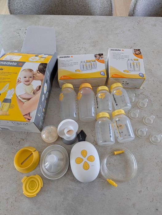 Помпа за кърма Medela и комплект шишета и биберони