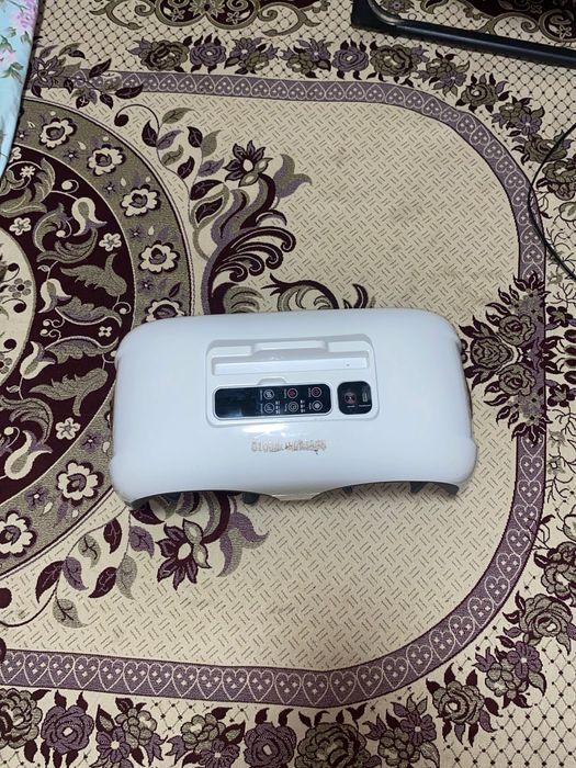 Массажный кресло