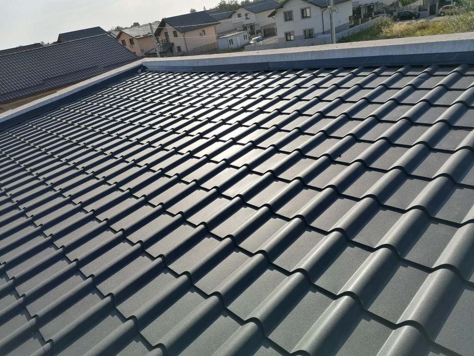 Reparatii acoperisuri tigla metalica velux