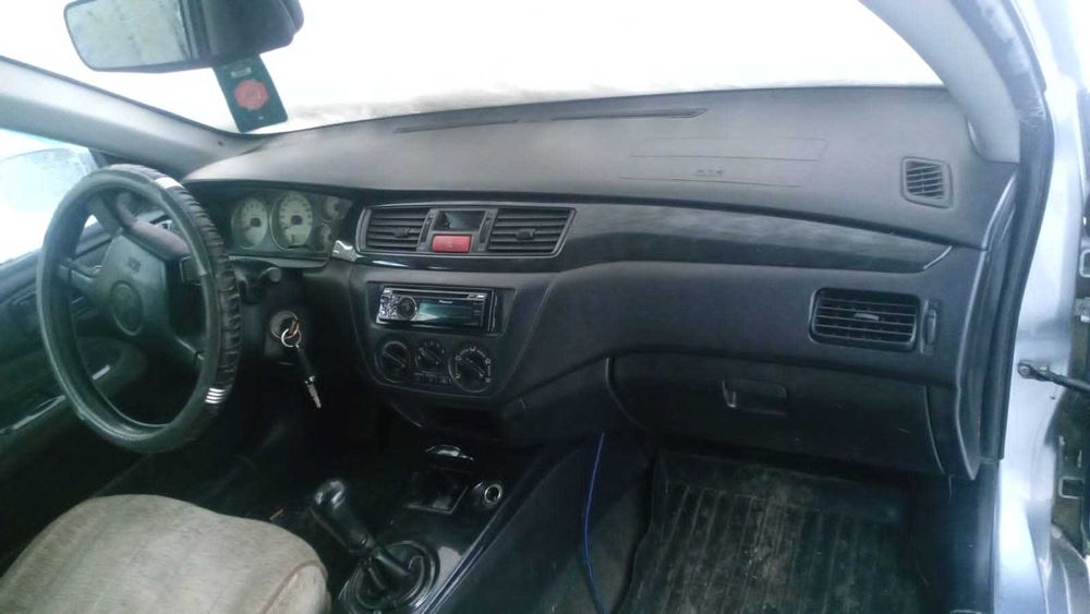 Мицубиши Лансер 9 битый 1,6л