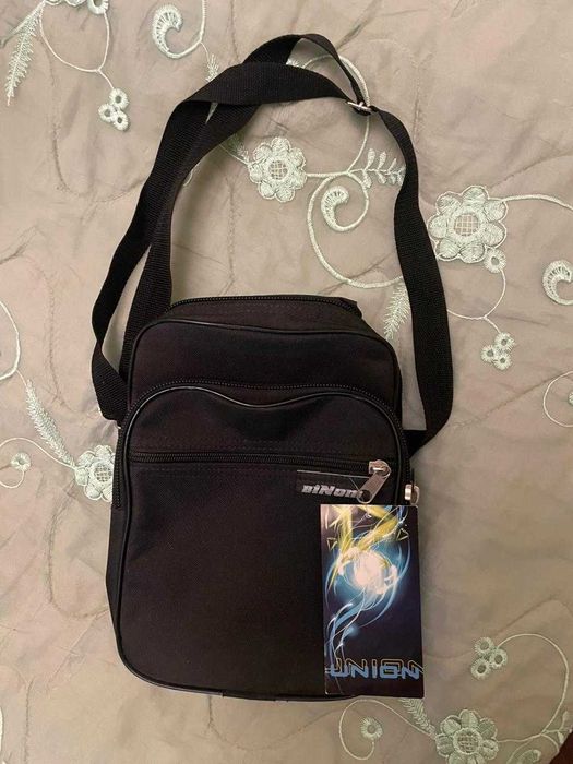 Новая дорожная сумка с ремешком