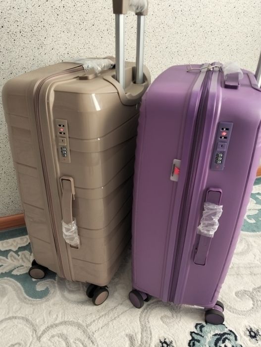 Продам новые чемоданы