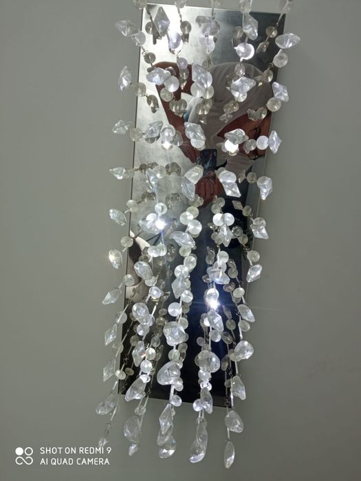 Lampa pe tavan cu leduri și țurțuri de sticlă baza de inox , dimensiuni  60 /35  cm.