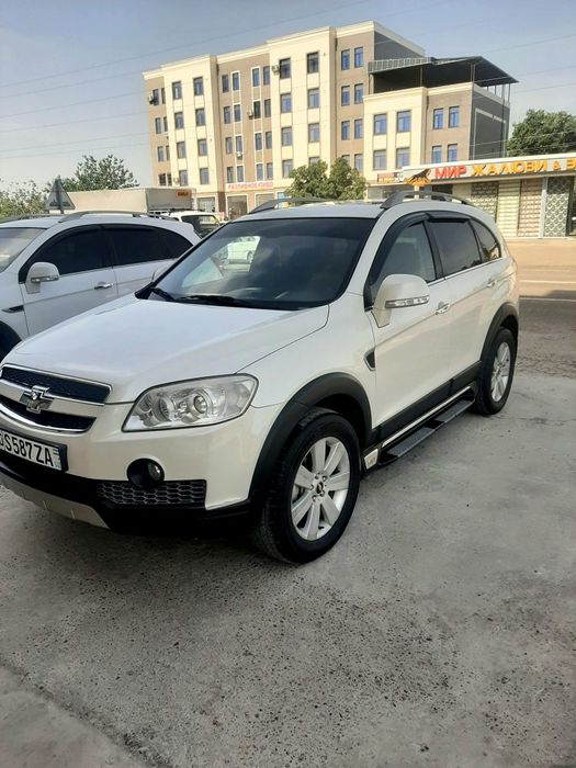 Каптива 1   2008 год белый жемчуг