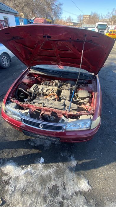 Мазда кронс машина