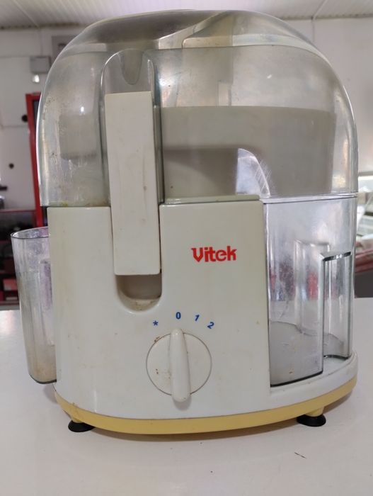 Соковыжималка электрическая.