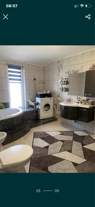 Casa la curte tip garsoniera cu living locuibil