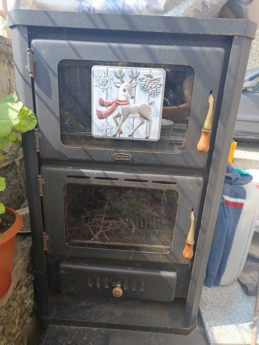 Камина отоплителна с водонагревател