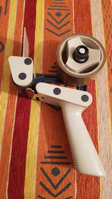 Vand derulator banda adeziva